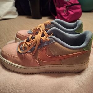 Nike Orange and Blue Sneakers with Low-Top Design